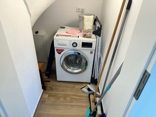 Waschtrockner, Staubsauger und Wischer