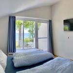 Schlafzimmer mit Meerblick