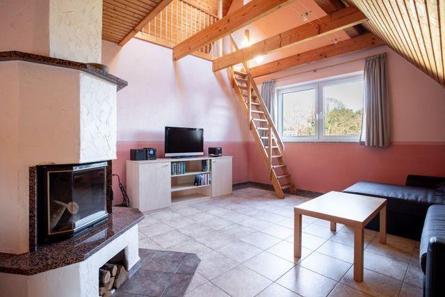 Ferienhaus Am Boddenufer - Ferienwohnung Falkenturm