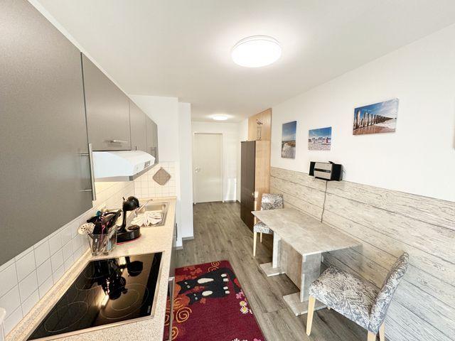 MR: Haus Inselperle mit Blick auf den Bodden - Wohnung 01 mit Terrasse und Boddenblick
